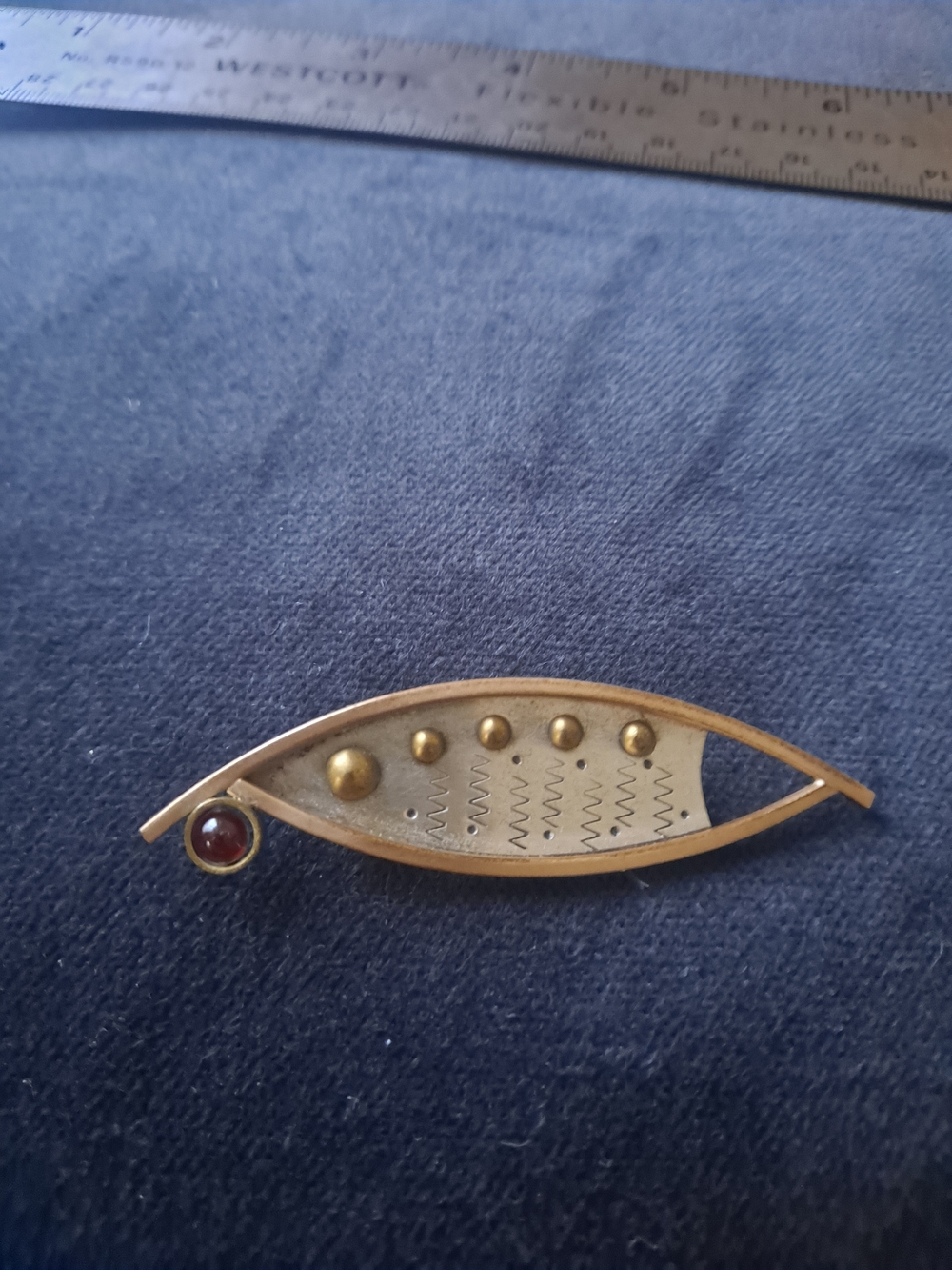 Gold-Tone Abstract Eye Brooch with Red Accent